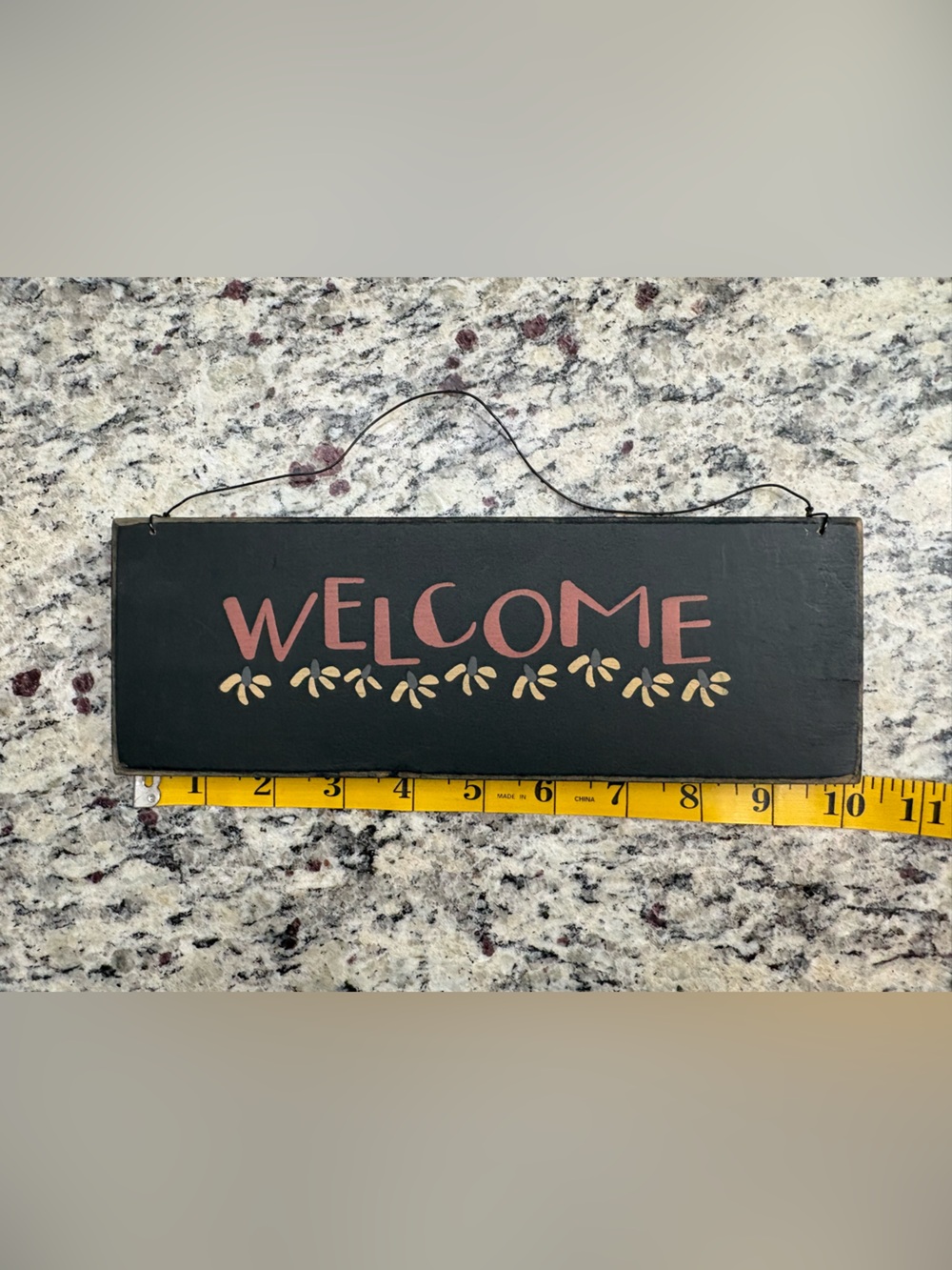 Black 'Welcome' Wall Plaque with Red Lettering and Cream Accents